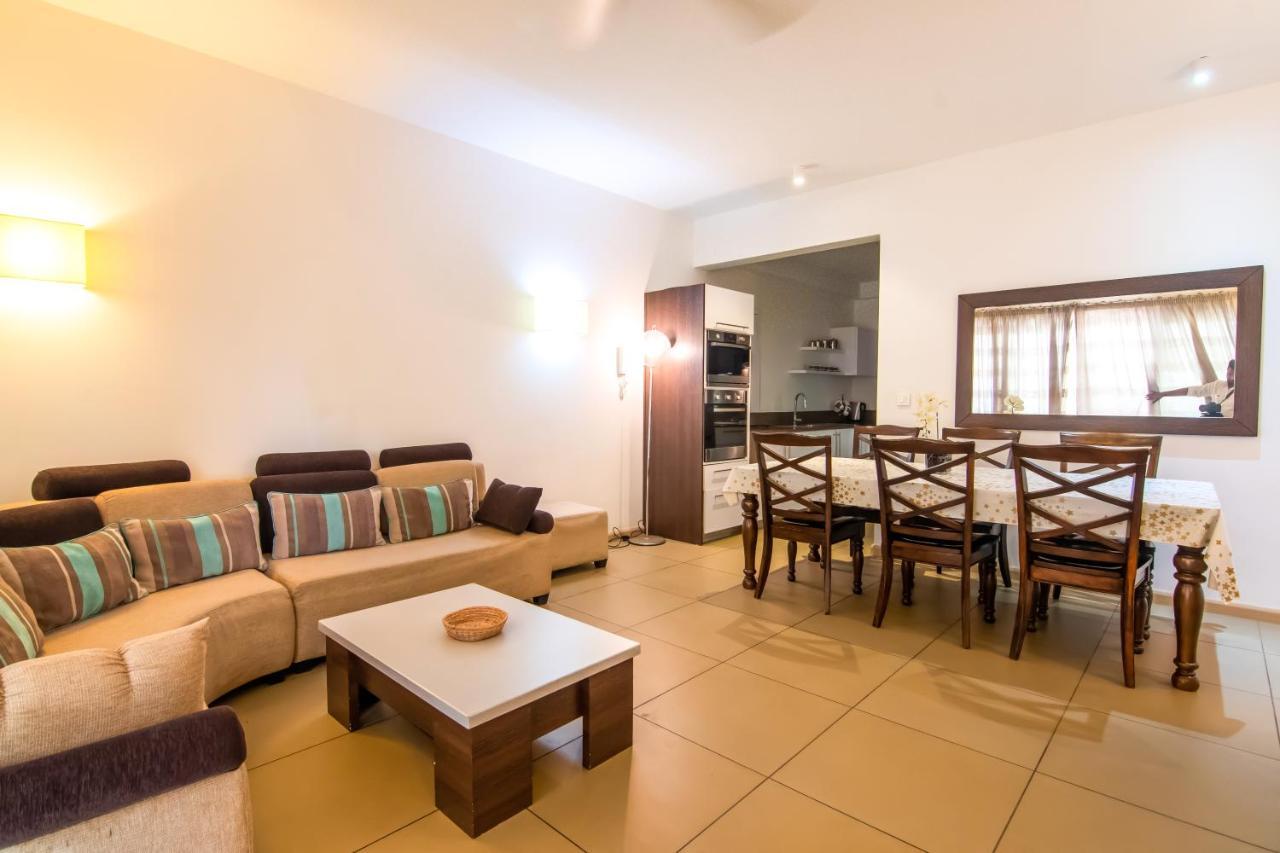 Azuri Ocean Village - Elegant 3-bedroom With Private Garden, & Pool Access In Holiday home Roches Noires