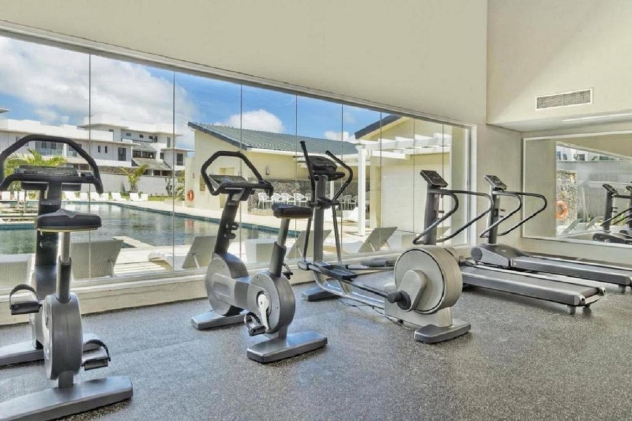 Holiday home Azuri Ocean Village - Elegant 3-bedroom With Private Garden, & Pool Access In *