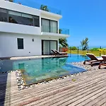 Stunning Beachfront Villa For A Perfect Getaway
