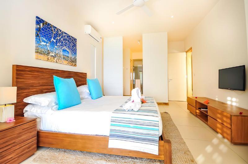 Cap Ouest Beachfront Residences *